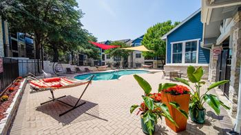 Resort style pool with outdoor entertainment space
